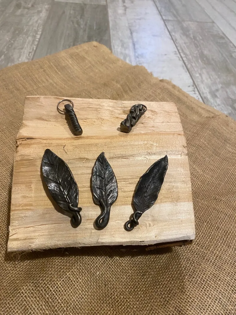 Small forged keyrings, cast and finished